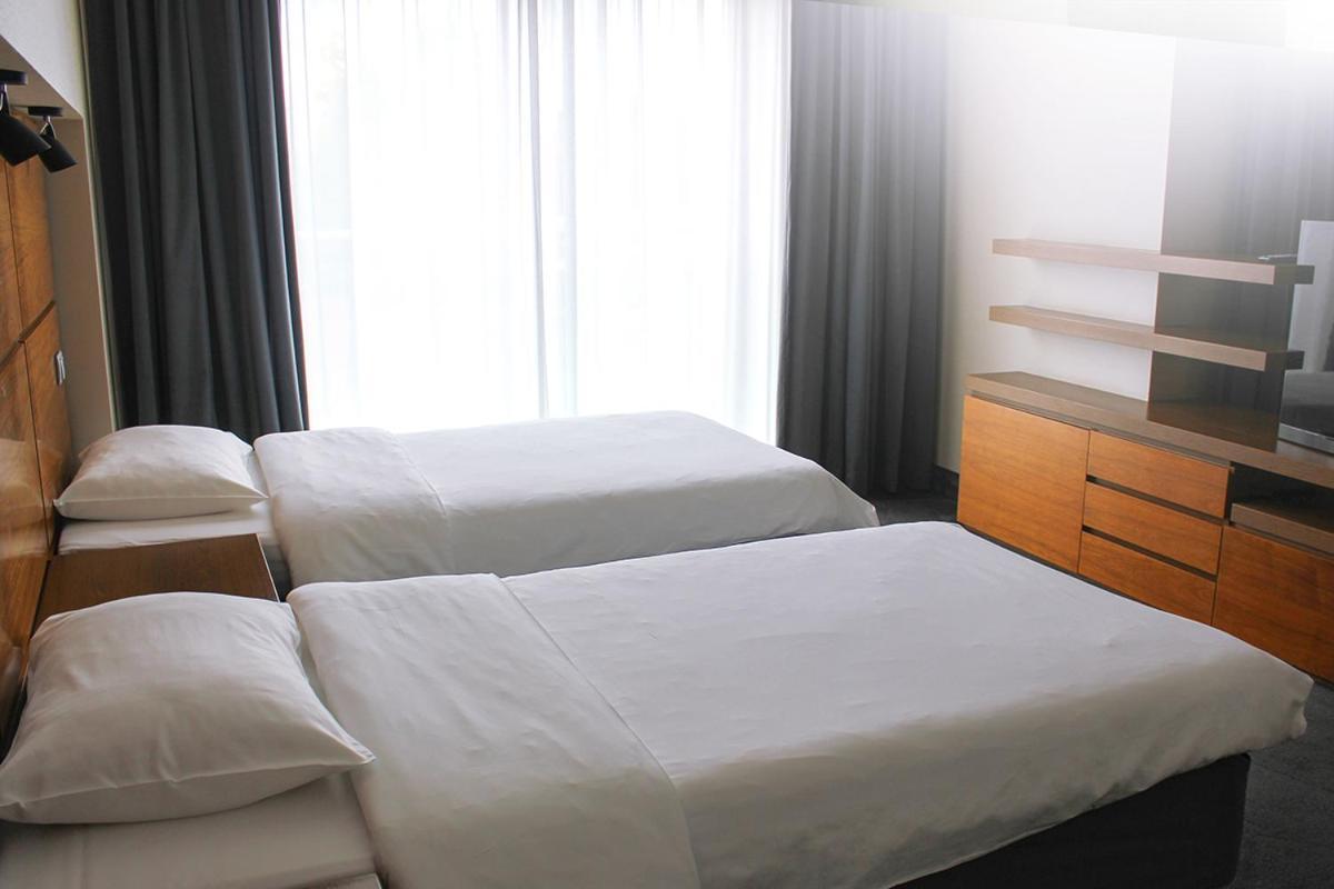 Willa Port Art & Business Ostróda Extérieur photo A bedroom at the hotel