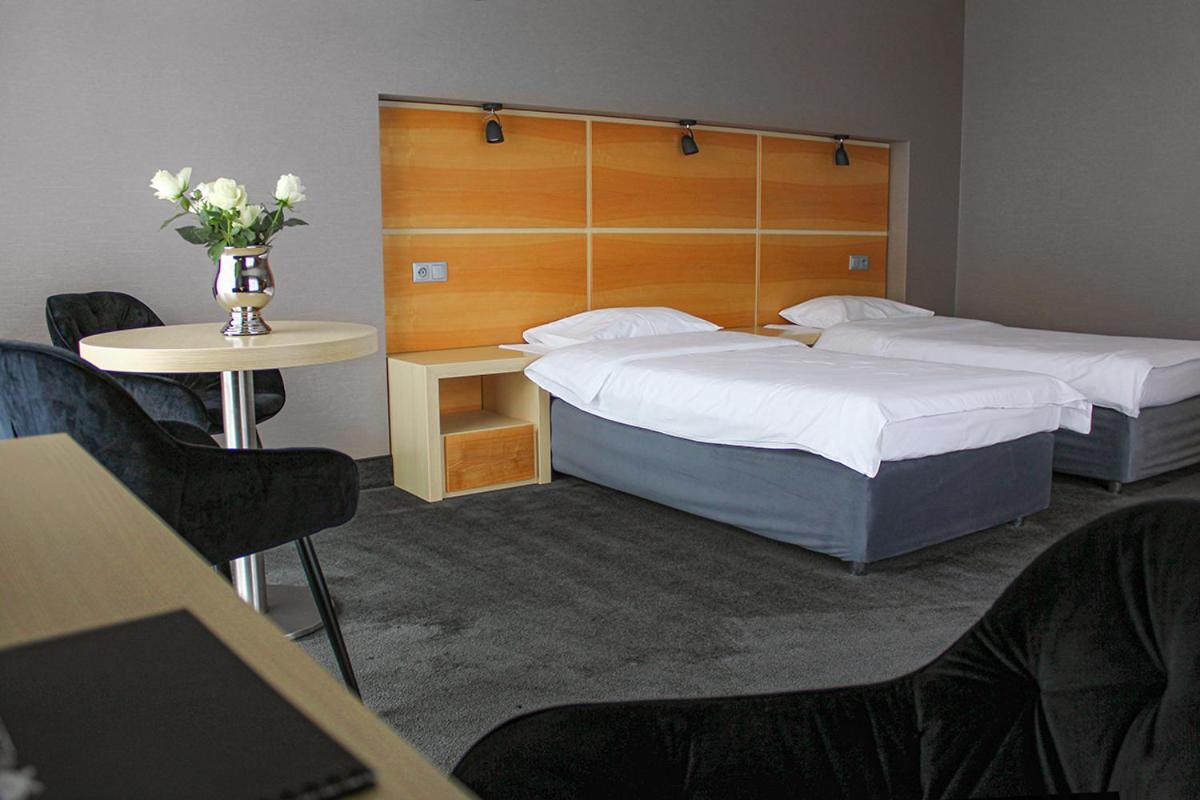 Willa Port Art & Business Ostróda Extérieur photo A room at the hotel