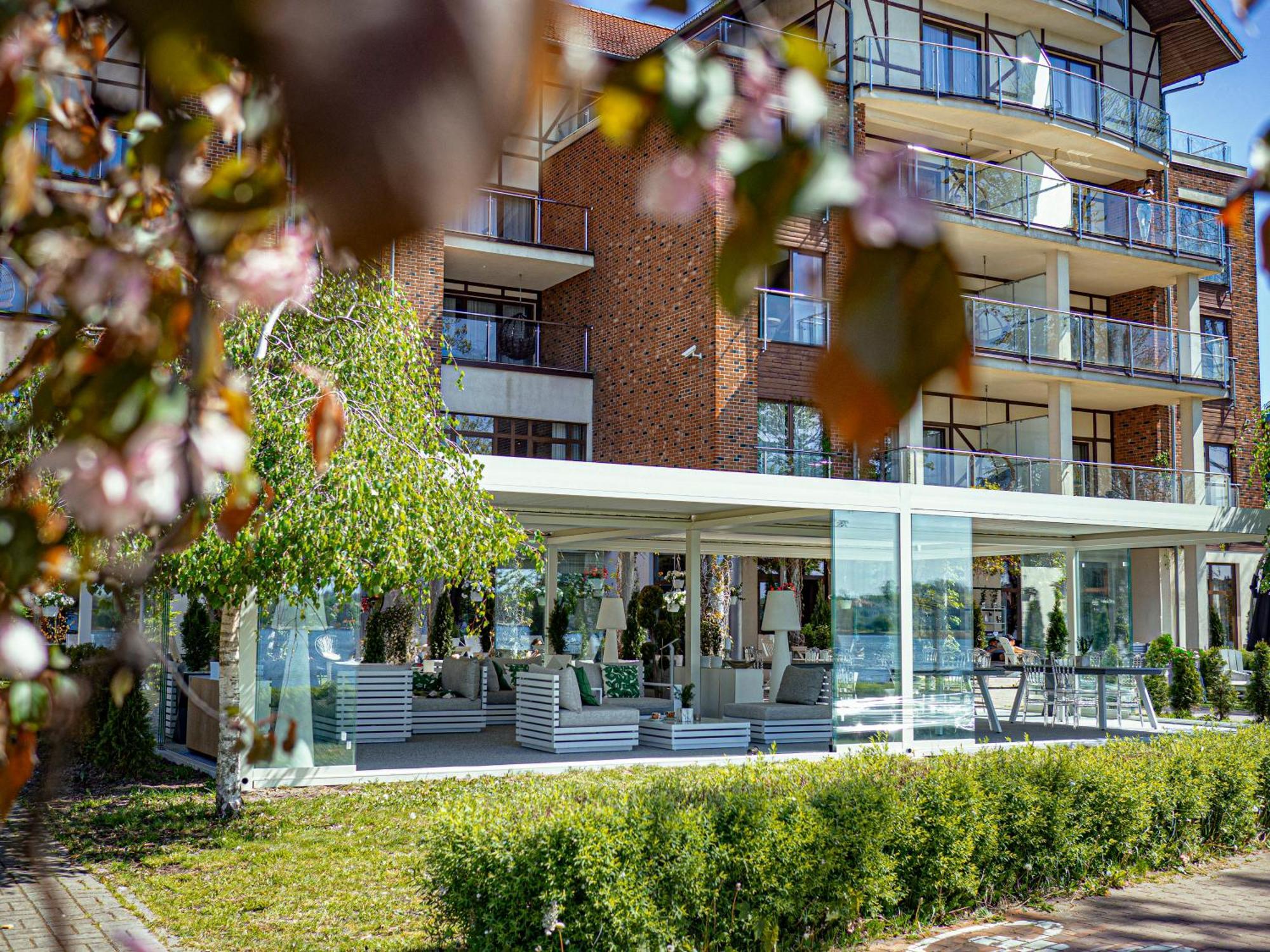 Willa Port Art & Business Ostróda Extérieur photo The hotel's main entrance